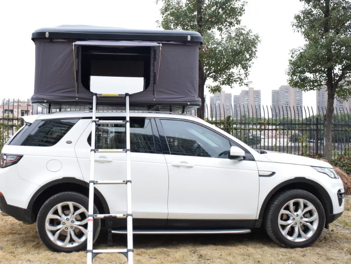 Grey ABS hard shell pop-up roof tent mounted on SUV, featuring vertical lift design for maximum interior space, manufactured by Camp Auto Parts.