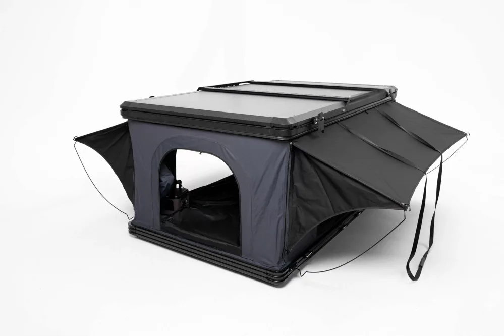 Side view of aluminum pop-up roof tent fully deployed with rain flys, featuring a box-style vertical lift design for maximum headroom.