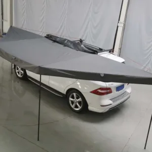 Overhead view of batwing style side awning showing aerodynamic shape and secure mounting, high-quality overland gear.