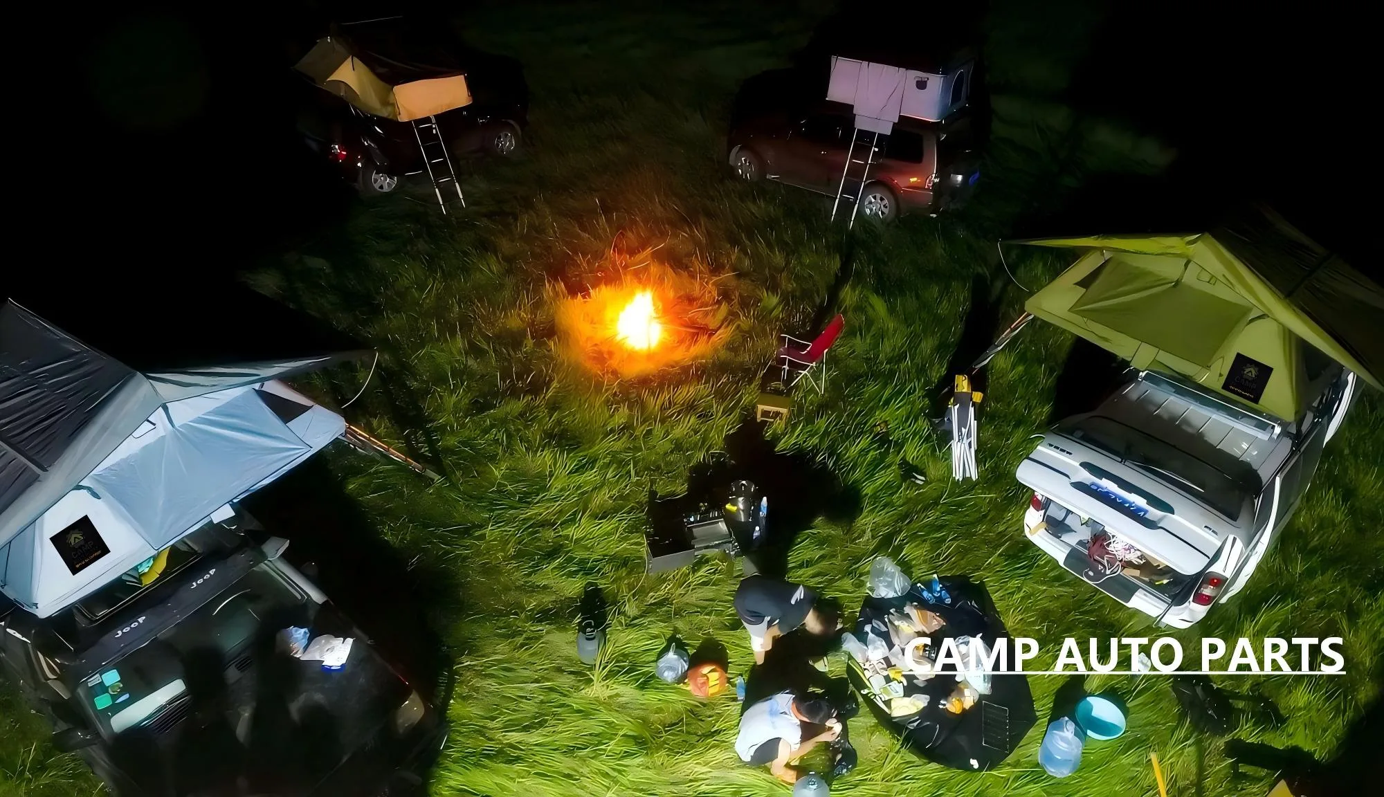 Cozy night camping scene with SUVs equipped with premium roof top tents, car side awnings, representing the quality of a leading B2B china rooftop tent manufacturer.