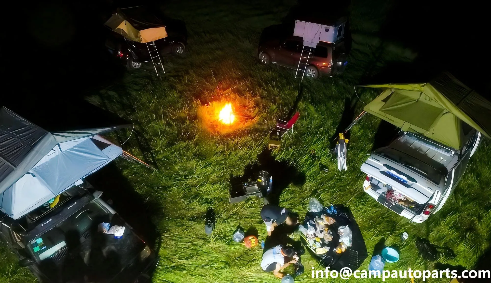 Resource Center 1 Cozy night camping scene with SUVs equipped with premium roof top tents, car side awnings, representing the quality of a leading B2B china rooftop tent manufacturer.