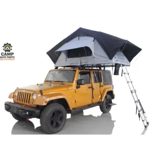 Camp Auto Parts classic model soft shell roof top tent with rainfly mounted on Jeep Wrangler.