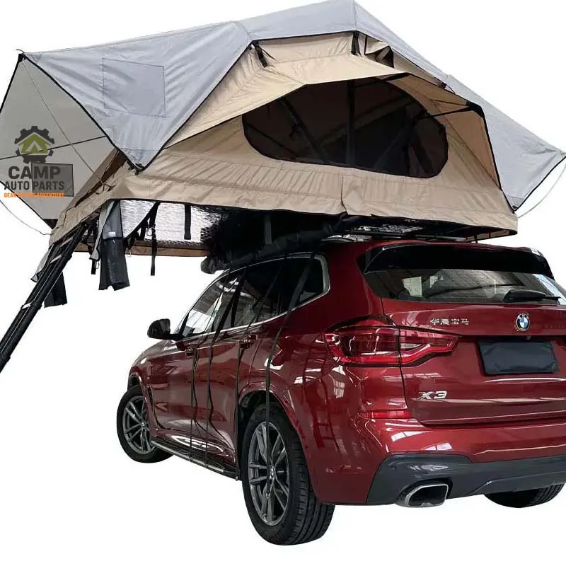 Low angle view showing the aluminum base and mounting system of the Camp Auto Parts roof tent.