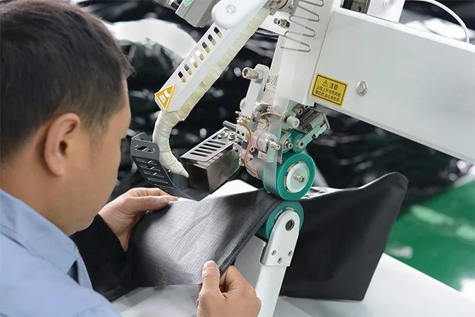 Machine applying protective coating to tent fabric. Advanced technology for UV Resistant and durable roof top tent materials.