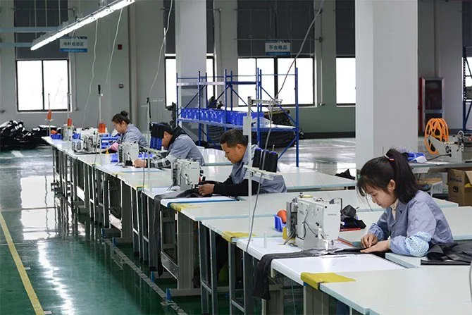 Busy sewing workshop with multiple production lines. High Manufacturing Capacity for Bulk Order fulfillment of roof top tents.